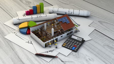 real estate concept: financial charts, plots and flat mock-up over wooden tableの写真素材