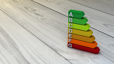 Energy efficiency concept: energy efficiency diagram over wooden floor