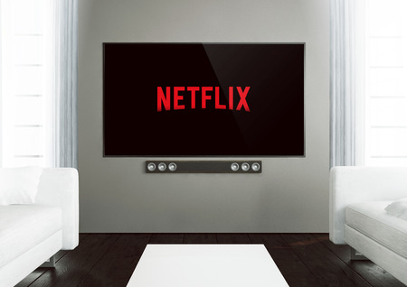 GIJON, SPAIN - OCTOBER 7, 2016: Netflix is a global provider of streaming movies and TV series. 3d...