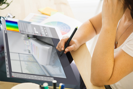 interior designer working on a tablet. All screen graphics are made up.の写真素材