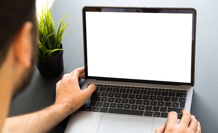Man working with responsive website design screen laptop mock-up