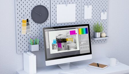graphic design studio with computer a different papers hanging on pegboard mock up