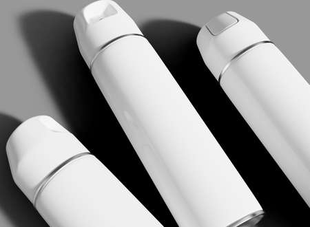 Three Aerosol Spray Bottles Mockup. Isoalted Product. 3d Renderingの写真素材