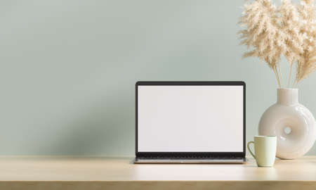 Simple Desktop with laptop cup, and plant 3d renderingの写真素材