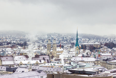 Winter landscape of Zurich with churches and lake. Grossmunster, Fraumunster and Enge.の写真素材