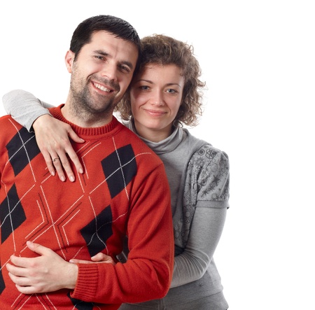 Young happy couple posing and huggingの写真素材