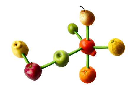 Connected fruits in the shape of molecular structure. Concept for vitamins diet.