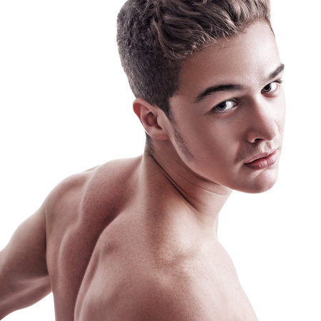 Young handsome man shirtless looking asideの写真素材