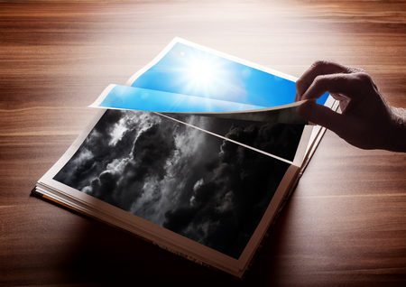 Flipping pages of a book. Concept for result of reading, or a new good day after a bad day, or involvement in switching from darkness to light...の写真素材