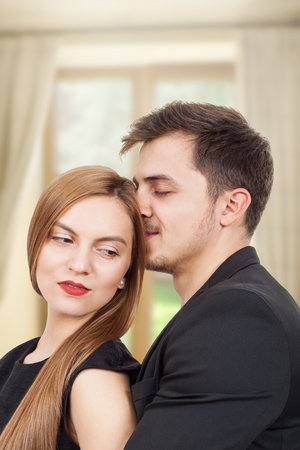Pair of young lovers enjoying a moment of joyの写真素材