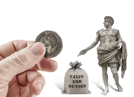 Hand offering ancient Caesar sculpture a coin with his image for taxes. Render therefore unto Caesar the things which are Caesar's (Matthew 22:20-22)の写真素材