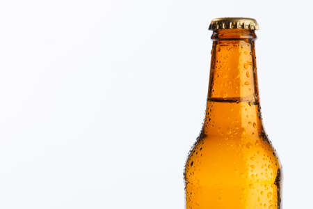 bottle of cold beer on white background, middle groundの写真素材
