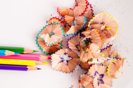 Color crayons and wood chips