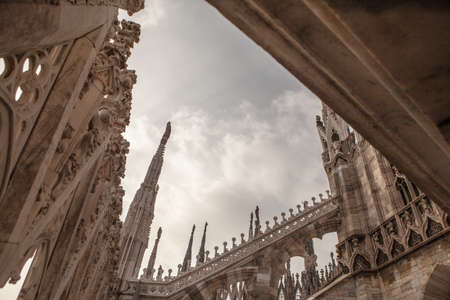 Milan, Italy - October 22, 2017: Detail view of the Duomo of Milan. The Cathedral of Milan is a Gothic cathedral located in the city of the same name. It is one of the largest Catholic worship churches in the world. The cathedral of Milan is a temple of gのeditorial素材