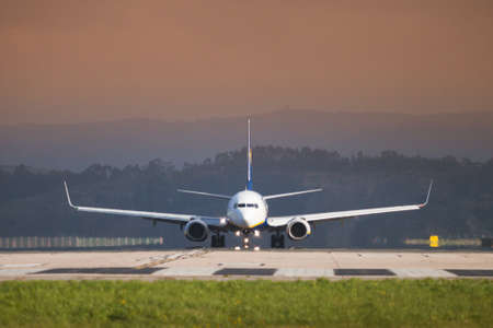 Seve Ballesteros airport, Santander, Spain - 12 March, 2018: Ryanair Boing 737 on the landing strip. The airline Ryanair offers flights from Santander to different European cities such as London, Rome, Dublin, Budapest ...のeditorial素材