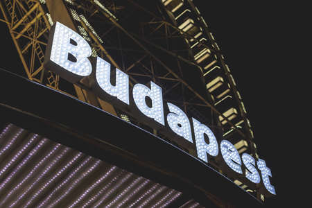 detail of the Budapest ferris wheel lettering poster at nightの写真素材