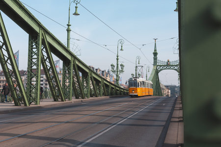 Tram circulating on the Liberty Bridge, in Budapest, Hungary.