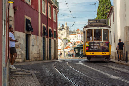 Lisbon, Portugal - September 11, 2020: tram circulating through the Plaza de Figueira, one of the best known areas of the Portuguese city.のeditorial素材
