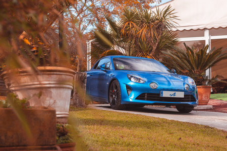 Vallines, Cantabria, Spain - October 23, 2020: Blue Alpine A110 2019 edition parked during an...