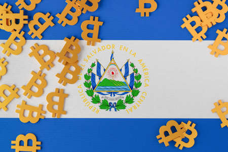 El Salvador flag with Bitcoin icons above it. 3d illustrationの写真素材