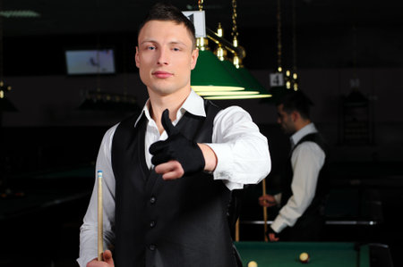 portrait of a young professional player before playing snooker  Billiards 