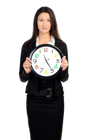 portrait of business woman with clock on whiteの写真素材