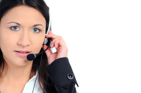 Woman operator with headset on white backgroundの写真素材
