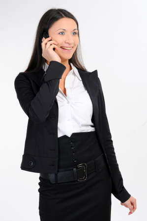 portrait of business woman with phone on whiteの写真素材