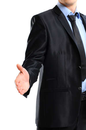 A business man with an open hand ready to seal a dealの写真素材