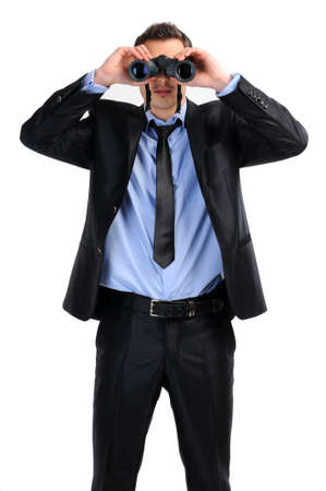 business man with binoculars looking to the futureの写真素材