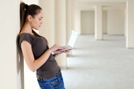 Young girl with laptopの写真素材