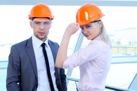 People in helmets on a construction siteの写真素材