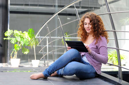happy woman with tablet pc computerの写真素材