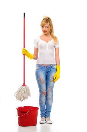 Cleaning woman washing floor with mop and bucket during spring cleaningの写真素材