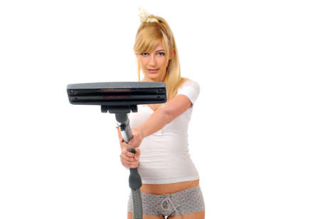 Woman cleaning with vacuumの写真素材