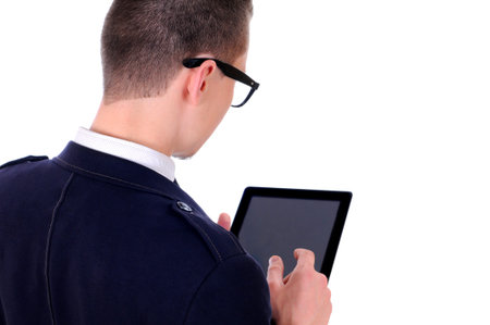 Young business man with tablet computer  Isolated over white background 
