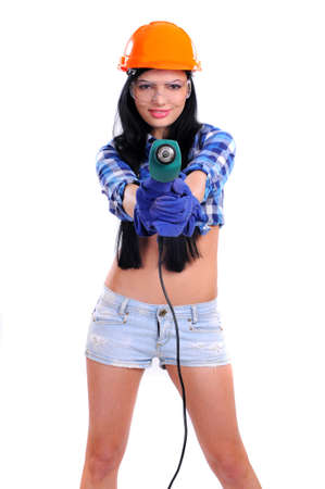 Young Woman Construction with Drill  Isolated on Whiteの写真素材