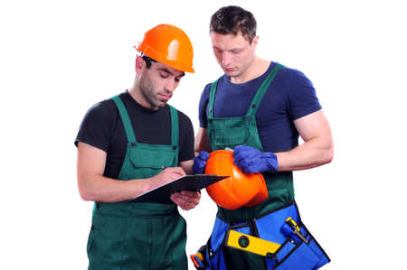 two construction men discuss projectの写真素材