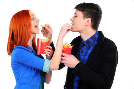 young people eating fast foodの写真素材