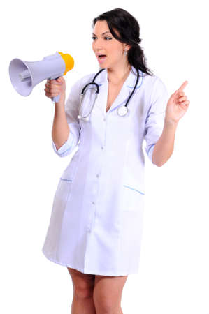medical doctor woman yelling through megaphone isolated on whiteの写真素材