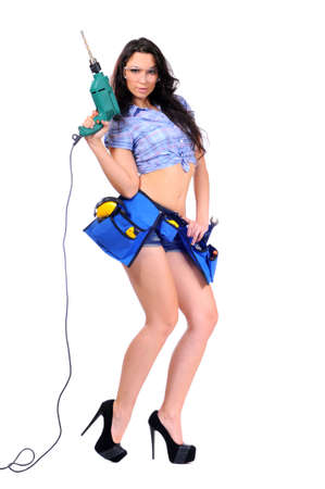 Young woman with screwdriver on a white background の写真素材