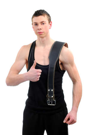 handsome young muscular sports man on white backgroundの写真素材