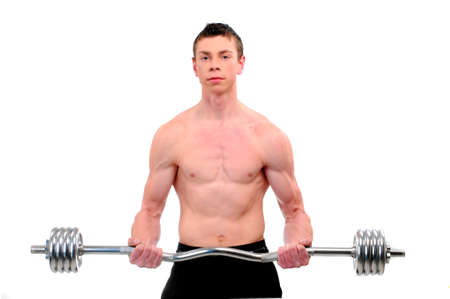young guy doing exercise with barbell isolated on whiteの写真素材
