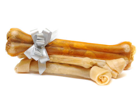 Dog biscuits bone shaped wrapped as giftの写真素材