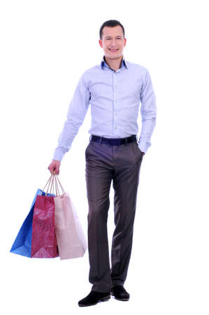 man with bags for shopping on a white backgroundの写真素材