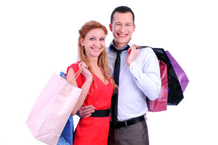 Boy and girl brings bags in different colors の写真素材
