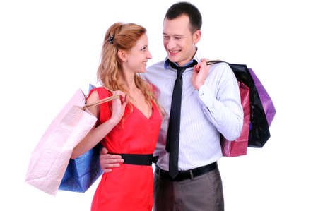 Boy and girl brings bags in different colors の写真素材