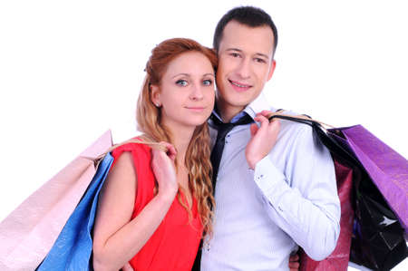 Boy and girl brings bags in different colors の写真素材