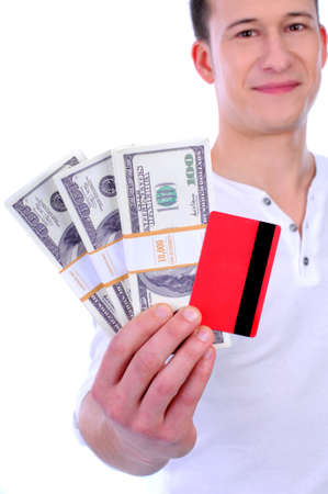 man holding a money and credit cardの写真素材