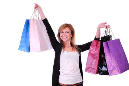 lovely woman with shopping bags over white backgroundの写真素材